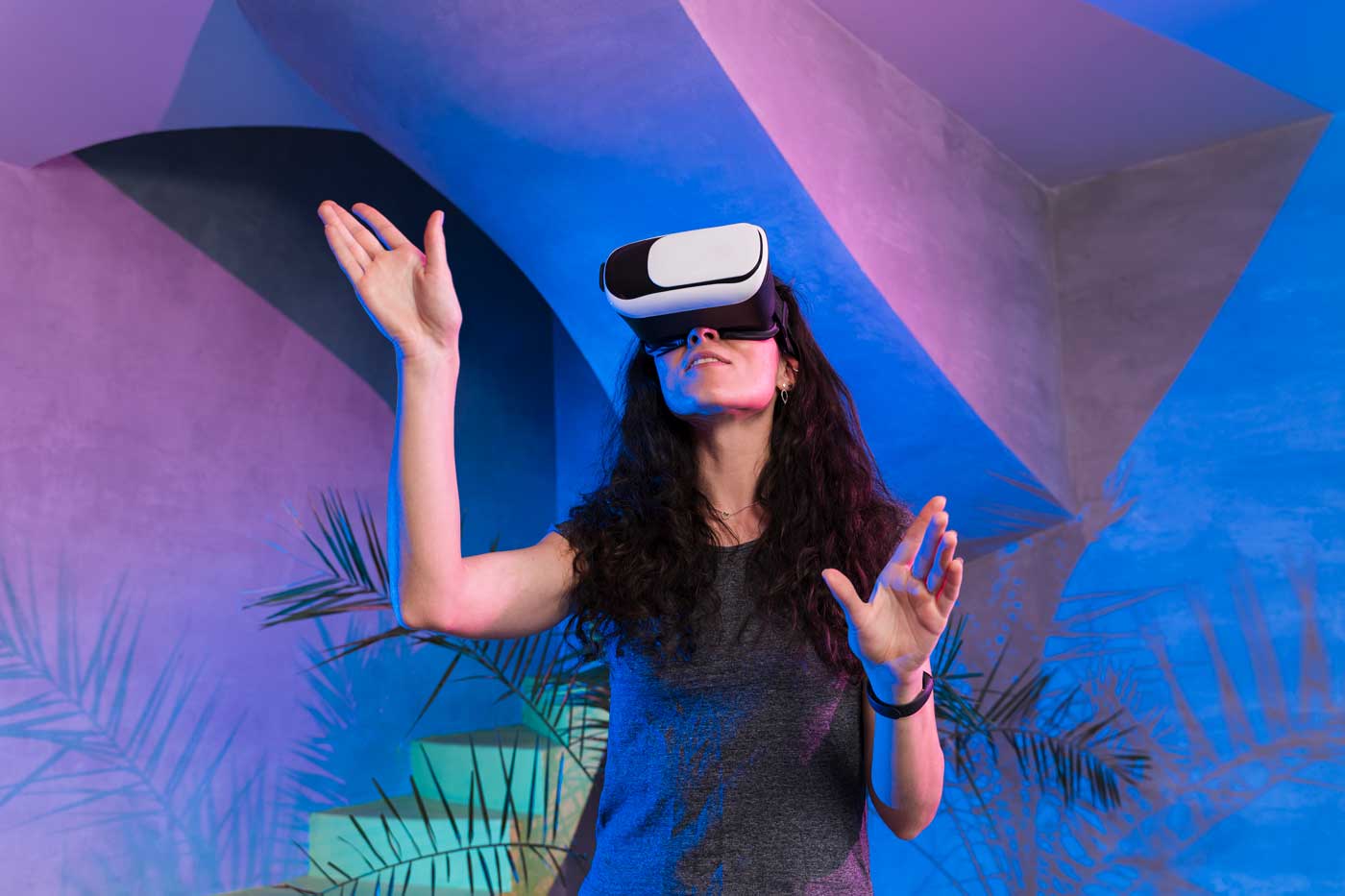 woman playing games on vr set